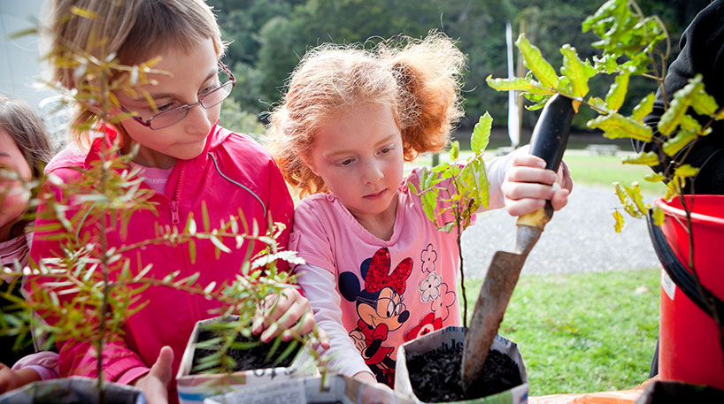 Children planting outdoors
